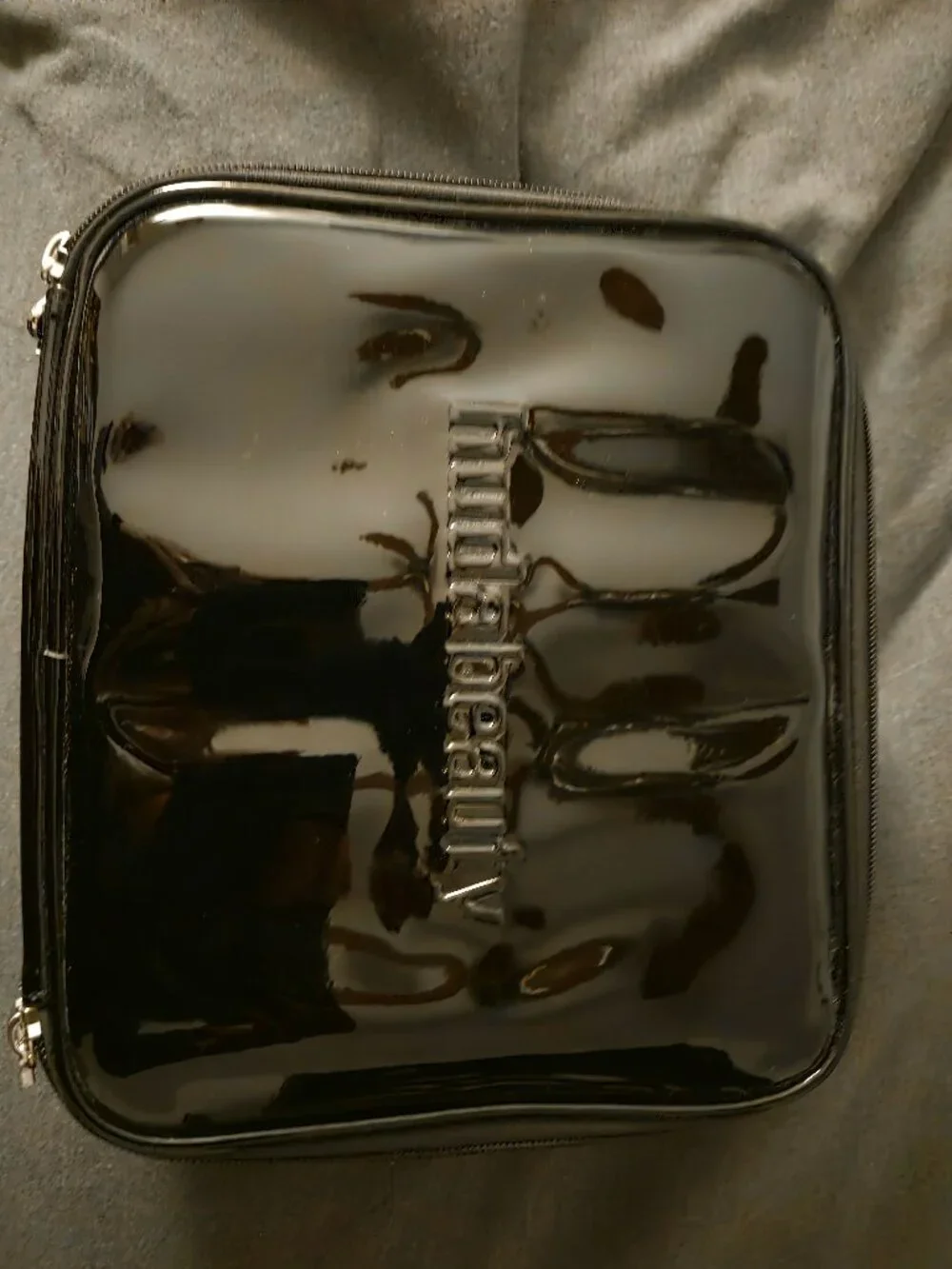 Huda Beauty case, Brigitte Tanaka bag, Too Faced, R.E.M. beauty, Her+